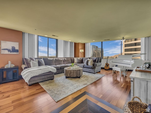 44 W Broadway S Unit 2005S, Salt Lake City, UT 84101 - living room with hardwood / wood-style flooring, healthy amount of natural light, and a wall of windows