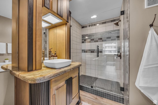44 W Broadway S Unit 2005S, Salt Lake City, UT 84101 - bathroom with a shower stall, vanity, and recessed lighting