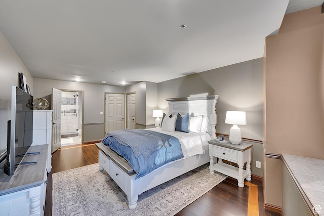 44 W Broadway S Unit 2005S, Salt Lake City, UT 84101 - bedroom featuring wood finished floors and connected bathroom