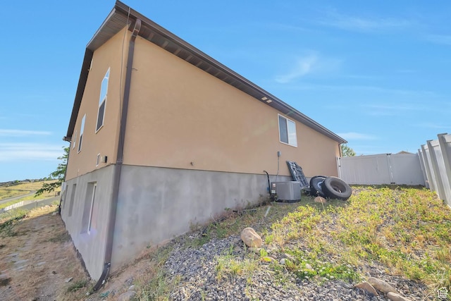 633 Little Rock Dr, Santaquin, UT 84655 - view of side of home featuring stucco siding