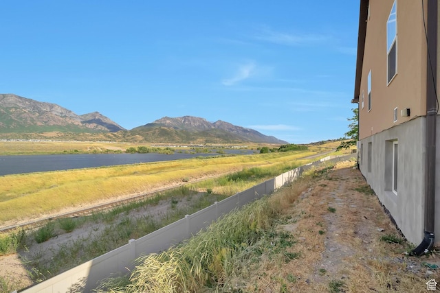 633 Little Rock Dr, Santaquin, UT 84655 - view of mountain backdrop with a large body of water and rural landscape