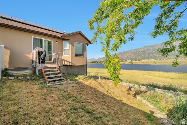 633 Little Rock Dr, Santaquin, UT 84655 - view of grassy yard with a water and mountain view