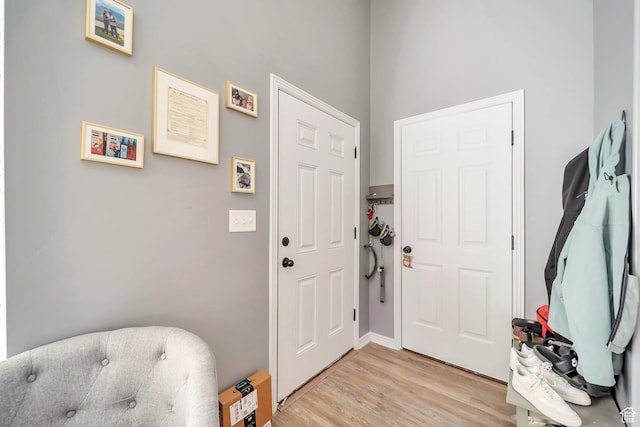 633 Little Rock Dr, Santaquin, UT 84655 - foyer entrance with light wood-style floors and baseboards