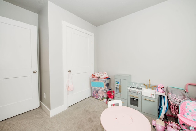 2726 S 2250 W Unit 218, West Haven, UT 84401 - rec room with carpet flooring and baseboards