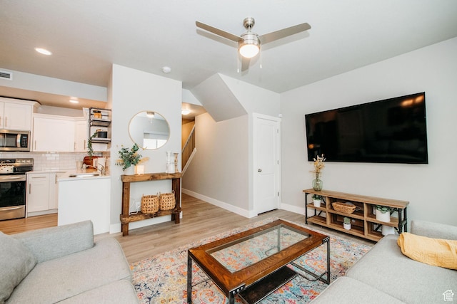 2726 S 2250 W Unit 218, West Haven, UT 84401 - living area with a ceiling fan, light wood-type flooring, and recessed lighting