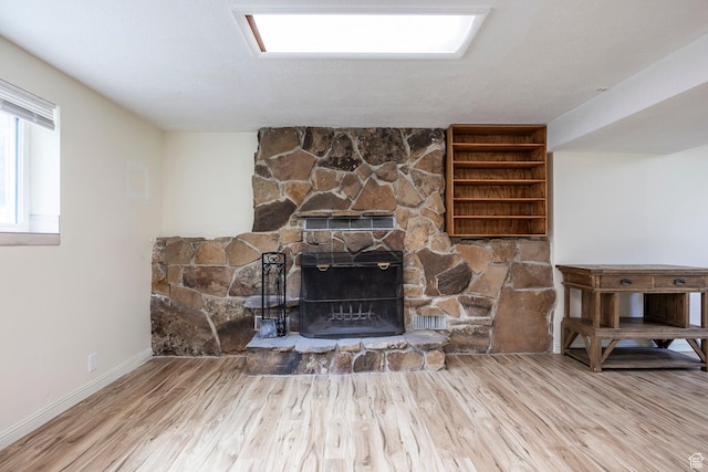 32 S Smokey Ln, Emigration Canyon, UT 84108 - detailed view of wood finished floors and a stone fireplace