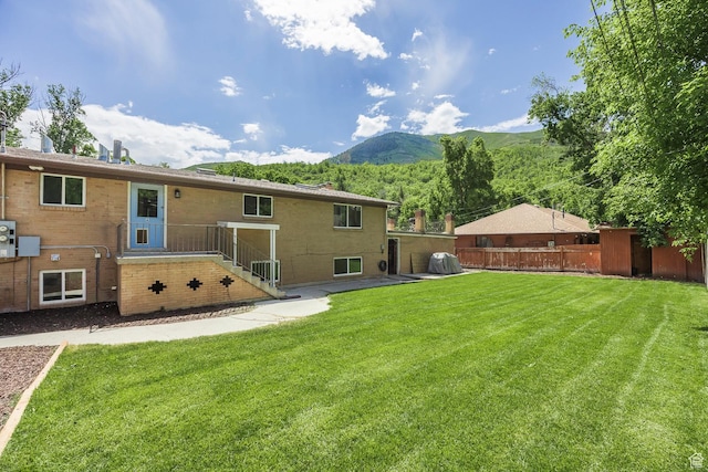 32 S Smokey Ln, Emigration Canyon, UT 84108 - rear view of house featuring a mountain view