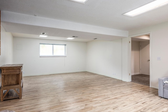 32 S Smokey Ln, Emigration Canyon, UT 84108 - basement with light wood finished floors and baseboards