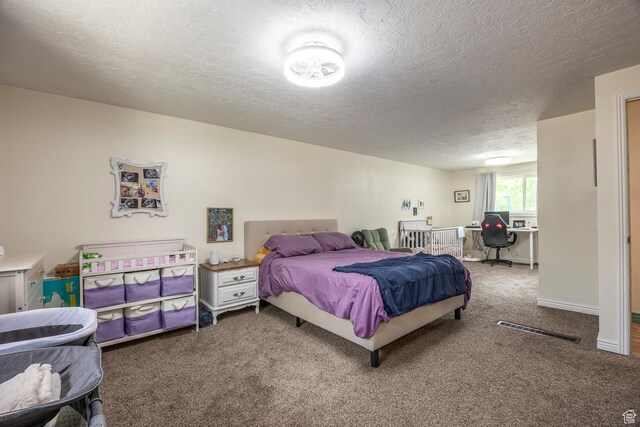 32 S Smokey Ln, Emigration Canyon, UT 84108 - bedroom with carpet floors, a textured ceiling, and a desk
