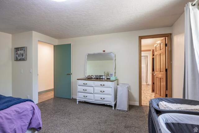 32 S Smokey Ln, Emigration Canyon, UT 84108 - bedroom with a textured ceiling and dark colored carpet