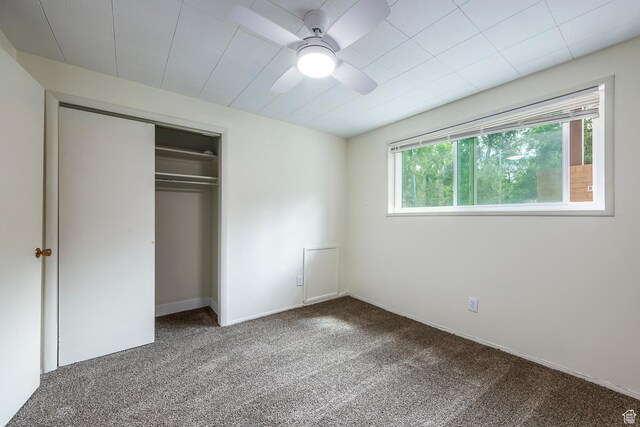 32 S Smokey Ln, Emigration Canyon, UT 84108 - unfurnished bedroom with carpet flooring, a closet, and a ceiling fan