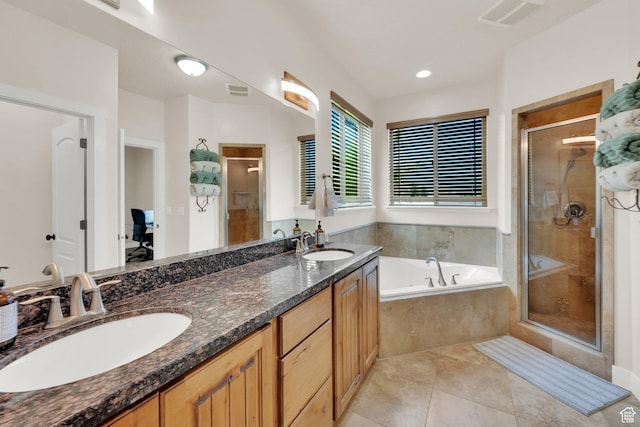 385 E 1000 S Unit 42, Salem, UT 84653 - bathroom featuring a stall shower, a bath, double vanity, and tile patterned flooring