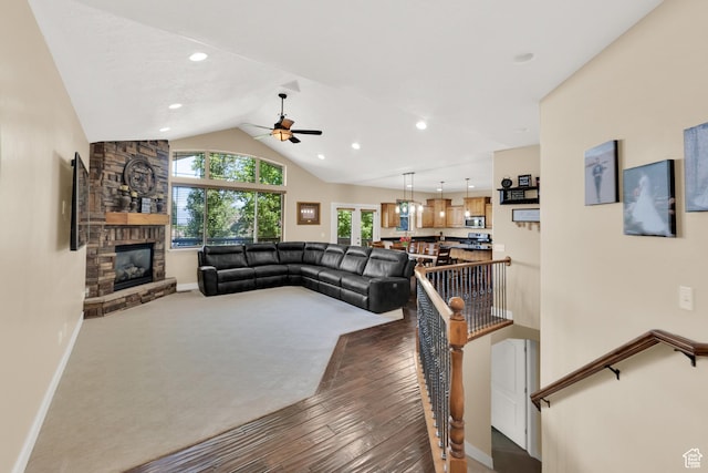 385 E 1000 S Unit 42, Salem, UT 84653 - living area featuring a ceiling fan, a stone fireplace, vaulted ceiling, recessed lighting, and carpet flooring