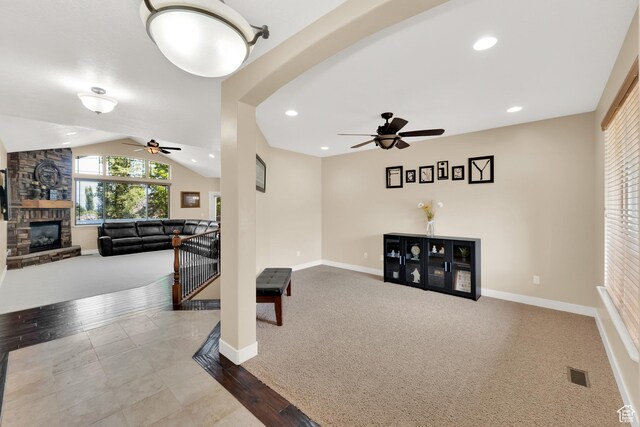 385 E 1000 S Unit 42, Salem, UT 84653 - unfurnished living room with ceiling fan, a fireplace, lofted ceiling, recessed lighting, and carpet