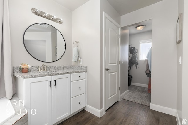 3694 E Tauri Way, St George, UT 84790 - bathroom with wood finished floors and vanity