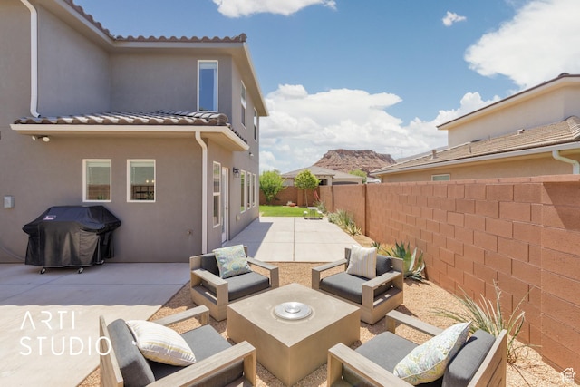 3694 E Tauri Way, St George, UT 84790 - fenced backyard with area for grilling, a patio area, and an outdoor hangout area