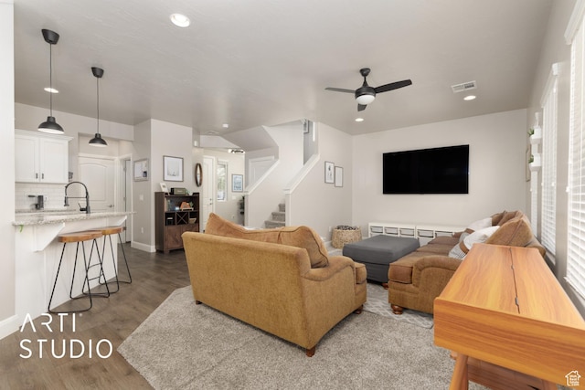 3694 E Tauri Way, St George, UT 84790 - living room featuring ceiling fan, recessed lighting, wood finished floors, stairs, and healthy amount of natural light