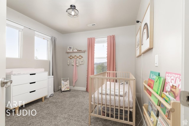 3694 E Tauri Way, St George, UT 84790 - carpeted bedroom featuring multiple windows and a crib