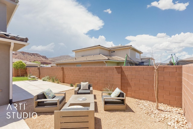 3694 E Tauri Way, St George, UT 84790 - fenced backyard with a patio area and an outdoor living space