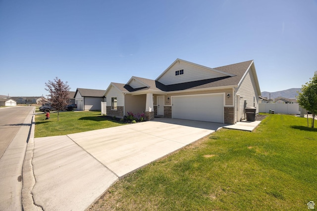 824 N 980 W, Tremonton, UT 84337 - view of front facade with an attached garage, concrete driveway, and roof with shingles