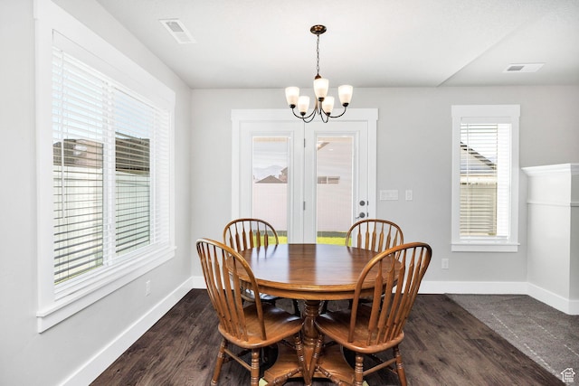 824 N 980 W, Tremonton, UT 84337 - dining area featuring a chandelier, healthy amount of natural light, and dark wood-type flooring