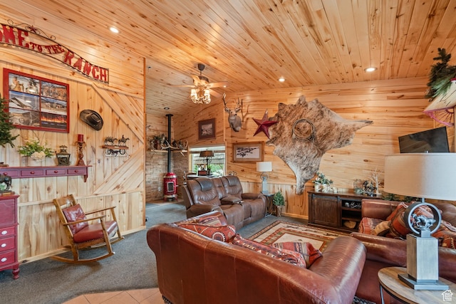 1665 E 1200 N, Mount Pleasant, UT 84647 - living room featuring wood ceiling, wooden walls, carpet floors, a wood stove, and vaulted ceiling