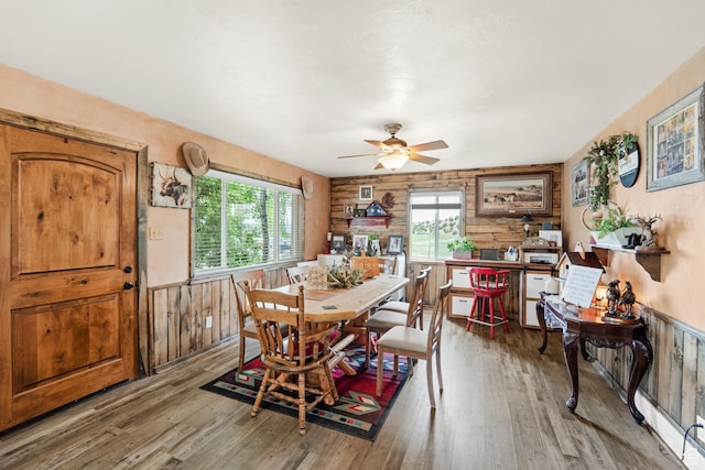 1665 E 1200 N, Mount Pleasant, UT 84647 - dining area with plenty of natural light, wooden walls, wood finished floors, ceiling fan, and wainscoting