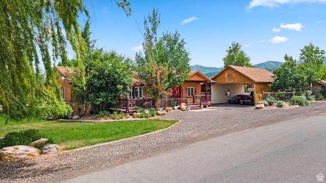1665 E 1200 N, Mount Pleasant, UT 84647 - view of front of property with dirt driveway, a front lawn, and a mountain view