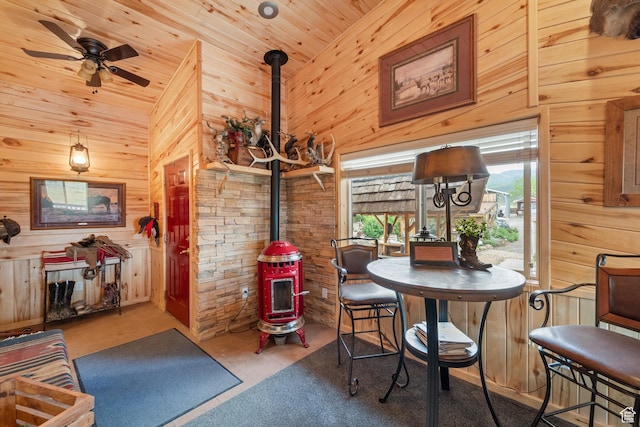 1665 E 1200 N, Mount Pleasant, UT 84647 - dining space with a wood stove, wood walls, wooden ceiling, vaulted ceiling, and ceiling fan