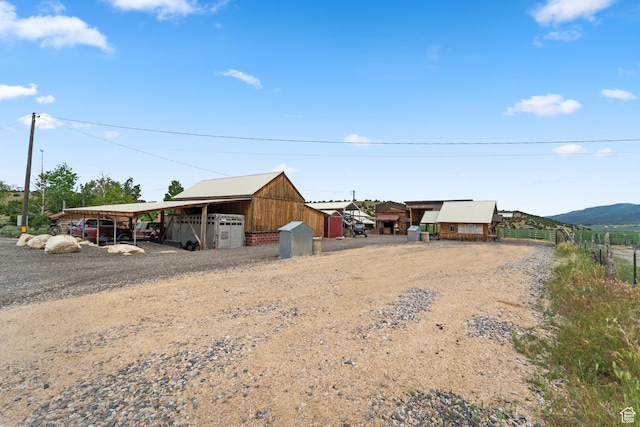 1665 E 1200 N, Mount Pleasant, UT 84647 - view of outbuilding featuring a carport and dirt driveway
