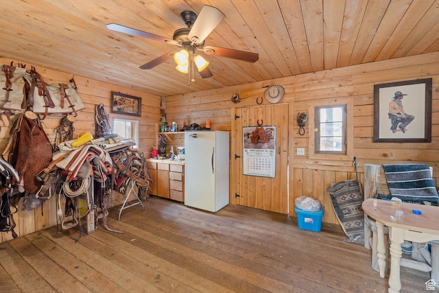 1665 E 1200 N, Mount Pleasant, UT 84647 - dining space with wooden ceiling, hardwood / wood-style floors, wooden walls, and a ceiling fan