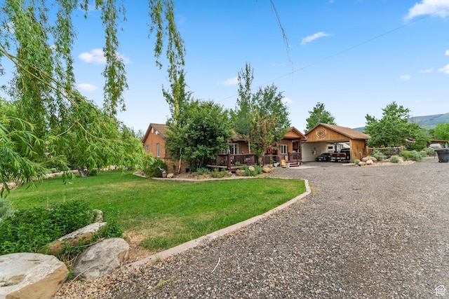 1665 E 1200 N, Mount Pleasant, UT 84647 - view of green lawn with gravel driveway and a carport