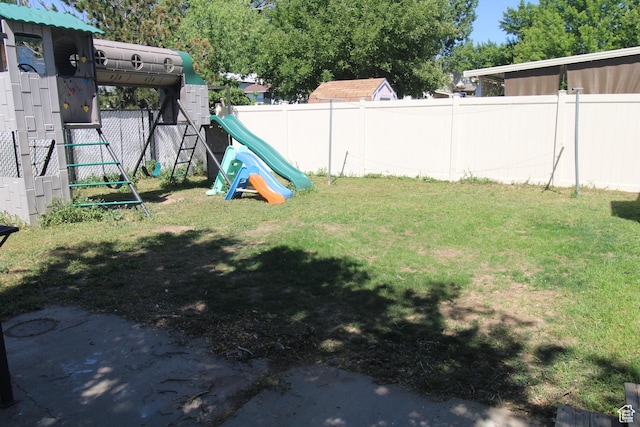 423 W 180 N, Clearfield, UT 84015 - fenced backyard featuring a playground