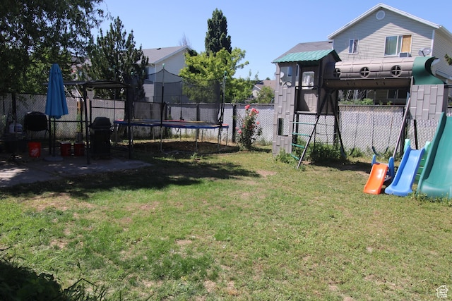 423 W 180 N, Clearfield, UT 84015 - fenced backyard featuring a trampoline and a playground