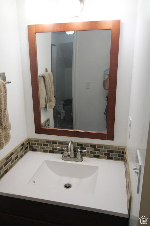 423 W 180 N, Clearfield, UT 84015 - bathroom with vanity and decorative backsplash