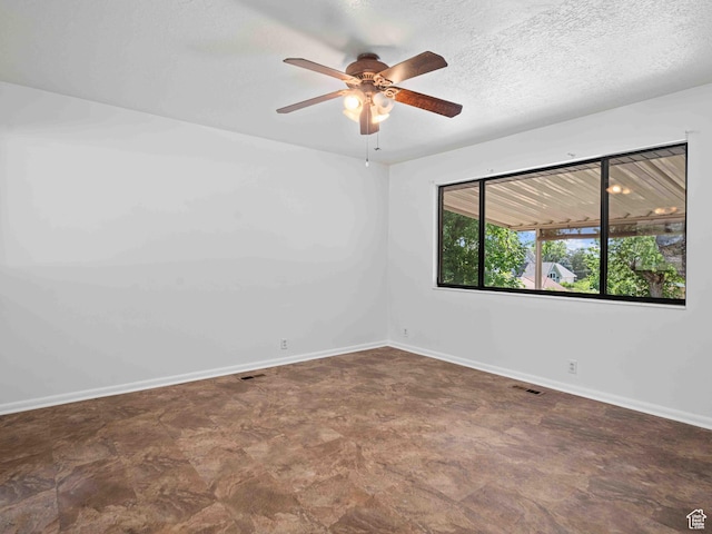2713 N 650 E, North Ogden, UT 84414 - empty room featuring a ceiling fan and baseboards