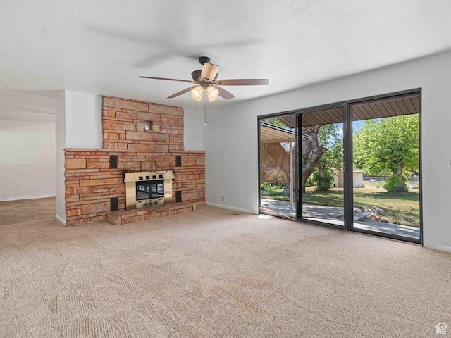 2713 N 650 E, North Ogden, UT 84414 - unfurnished living room featuring ceiling fan, carpet floors, and a fireplace