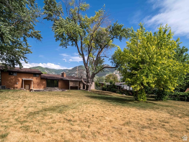 2713 N 650 E, North Ogden, UT 84414 - view of grassy yard featuring a mountain view