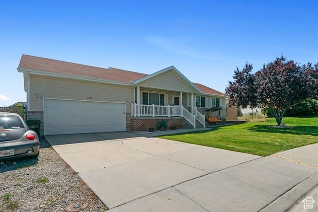 4015 S Brandon Ct, West Valley City, UT 84128 - single story home featuring covered porch, a garage, a front yard, and concrete driveway