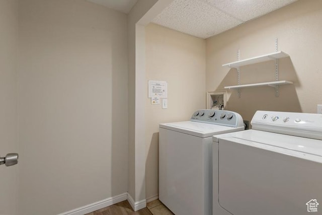 4015 S Brandon Ct, West Valley City, UT 84128 - laundry area with separate washer and dryer and light wood-style floors