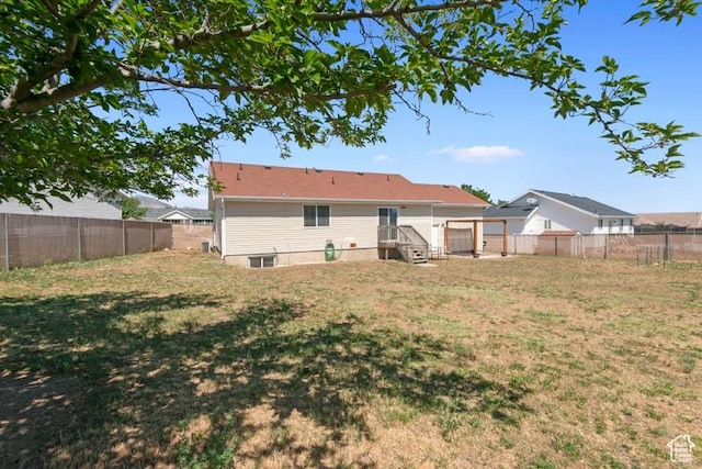 4015 S Brandon Ct, West Valley City, UT 84128 - rear view of house featuring a fenced backyard