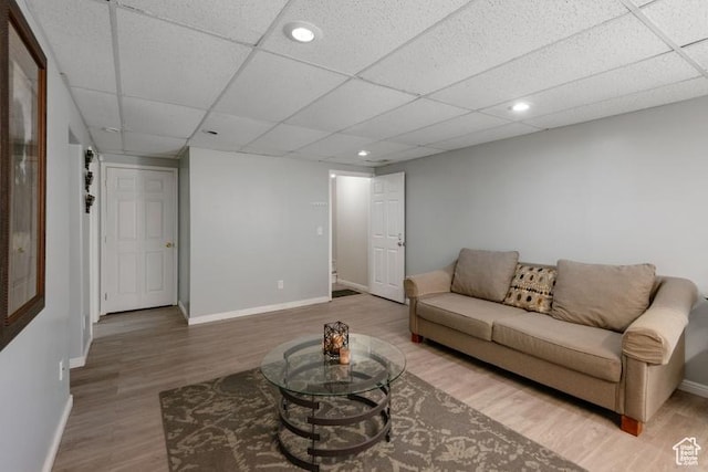 4015 S Brandon Ct, West Valley City, UT 84128 - living area with light wood-style floors, a drop ceiling, and recessed lighting