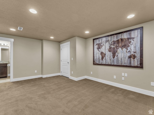 4956 W Vermillion Dr, South Jordan, UT 84009 - below grade area featuring carpet floors, recessed lighting, and a textured ceiling