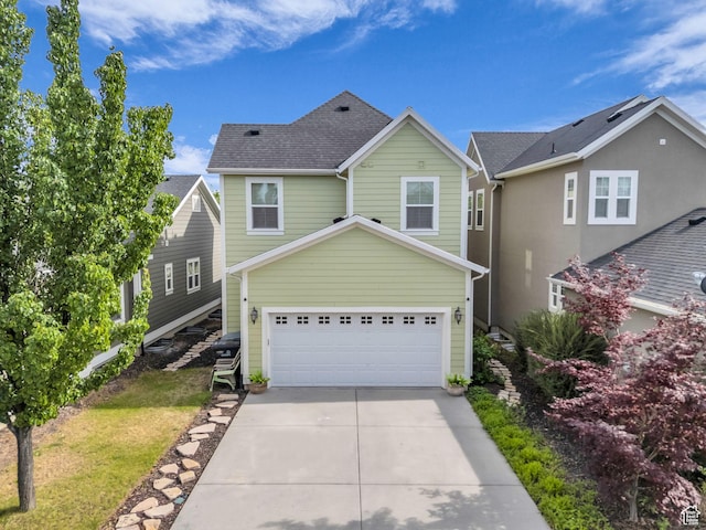 4956 W Vermillion Dr, South Jordan, UT 84009 - traditional home featuring concrete driveway, a shingled roof, and an attached garage