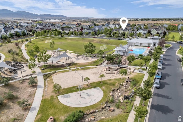 4956 W Vermillion Dr, South Jordan, UT 84009 - aerial view of property and surrounding area with nearby suburban area and a mountain backdrop