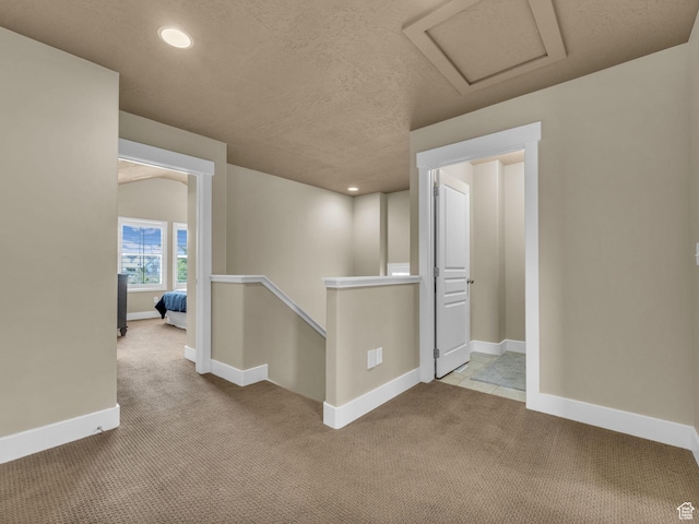 4956 W Vermillion Dr, South Jordan, UT 84009 - hall with carpet flooring, an upstairs landing, attic access, recessed lighting, and a textured ceiling