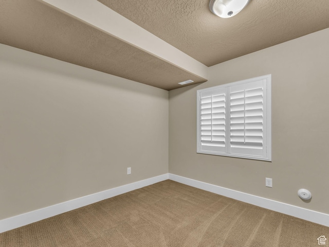 4956 W Vermillion Dr, South Jordan, UT 84009 - carpeted empty room featuring baseboards and a textured ceiling