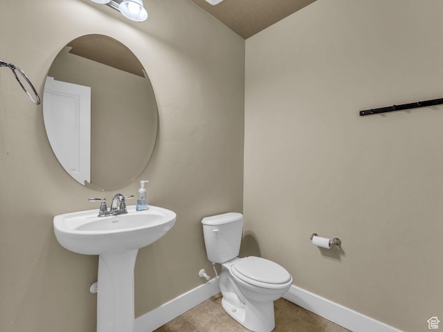 4956 W Vermillion Dr, South Jordan, UT 84009 - half bathroom featuring baseboards and tile patterned floors
