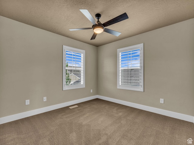 4956 W Vermillion Dr, South Jordan, UT 84009 - empty room with dark colored carpet, a ceiling fan, and a textured ceiling
