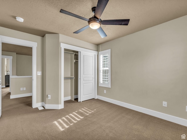 4956 W Vermillion Dr, South Jordan, UT 84009 - unfurnished bedroom with carpet floors, a textured ceiling, a closet, and a ceiling fan